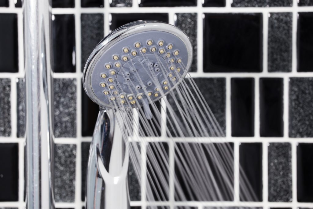 shower-head-bathroom-with-water-drops-flowing